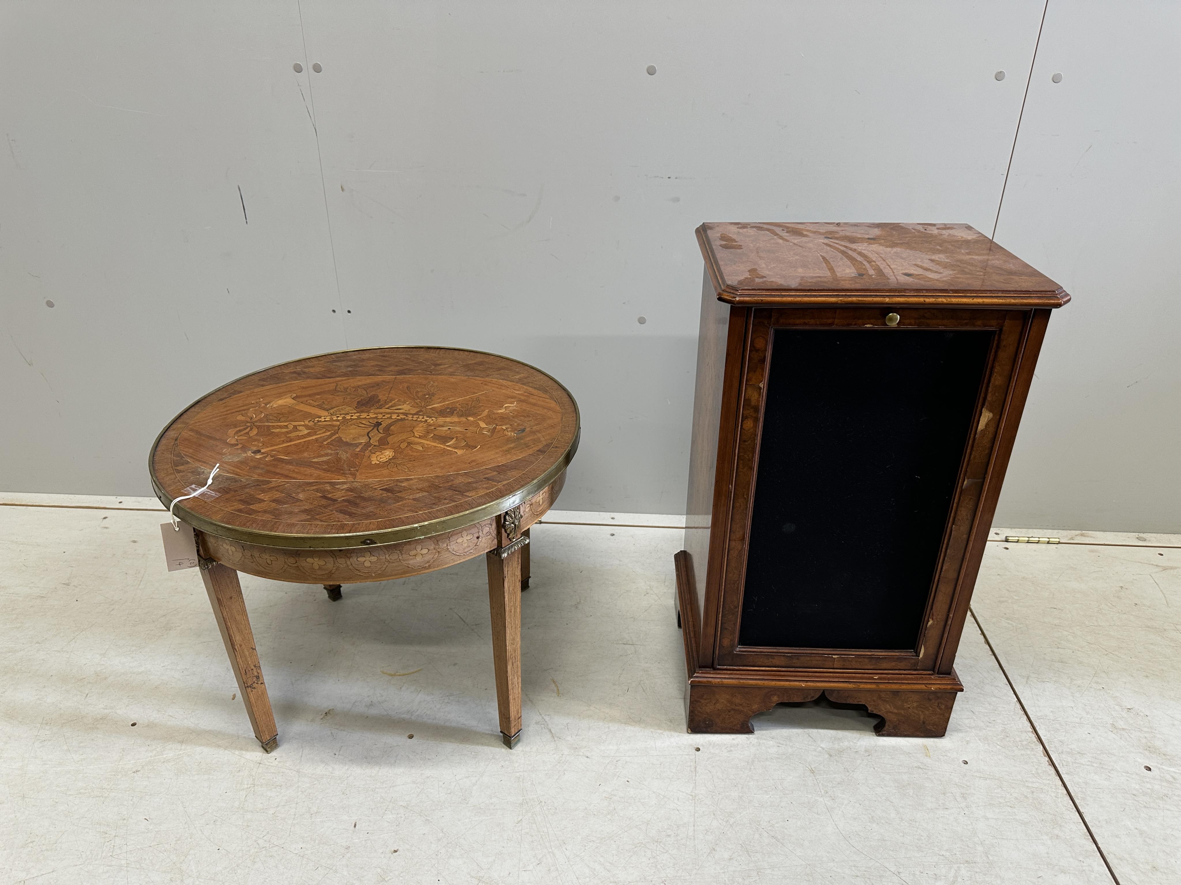 A French Transitional style circular marquetry inlaid coffee table, diameter 59cm, height 46cm together with a walnut speaker cabinet. Condition - poor to fair